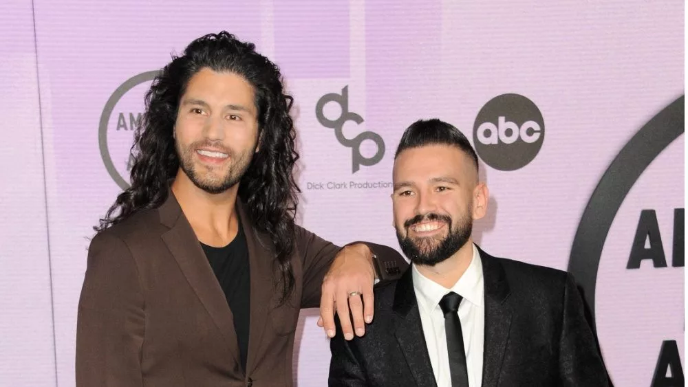 Dan Smyers and Shay Mooney of Dan + Shay at the 2022 American Music Awards held at the Microsoft Theater in Los Angeles, USA on November 20, 2022.