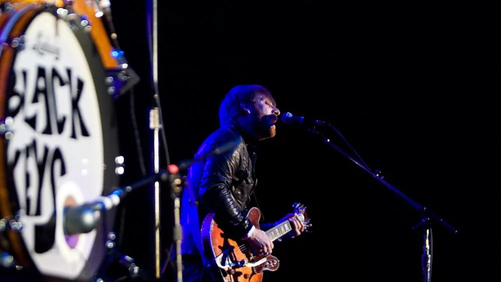 Dan Auerbach of the Black Keys playing guitar and singing on stage during the Deck the Hall Ball in Seattle, WA on December 8, 2010.