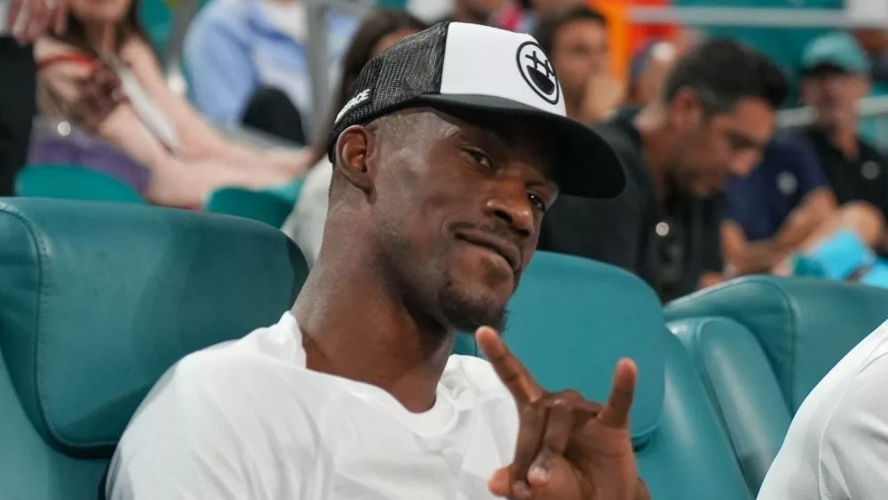 Jimmy Butler, an American professional basketball player for the Miami Heat, attends the semifinal match at 2023 Miami Open at the Hard Rock Stadium in Miami MIAMI GARDENS, FLORIDA - MARCH 31, 2023