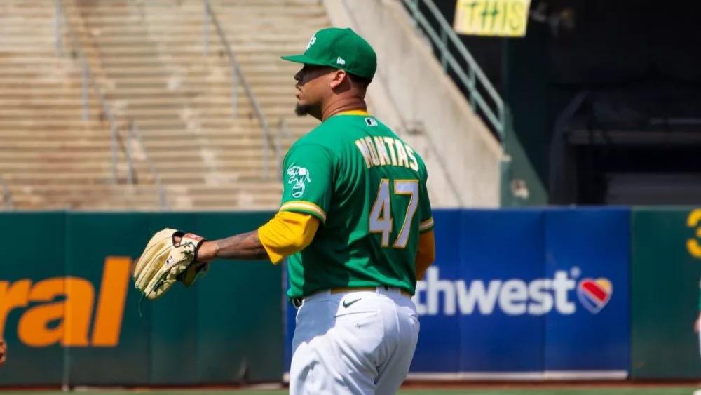 Frankie Montas #47 of the Oakland Athletics pitches against the New York Yankees at RingCentral Coliseum. Oakland, California - August 28, 2021