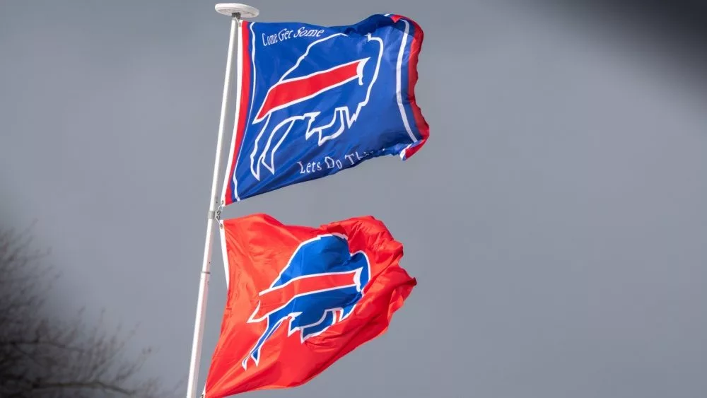 Two Buffalo Bills Bison Football Flags Flying on the same Flag Pole Blasdell, USA- January 20 2020