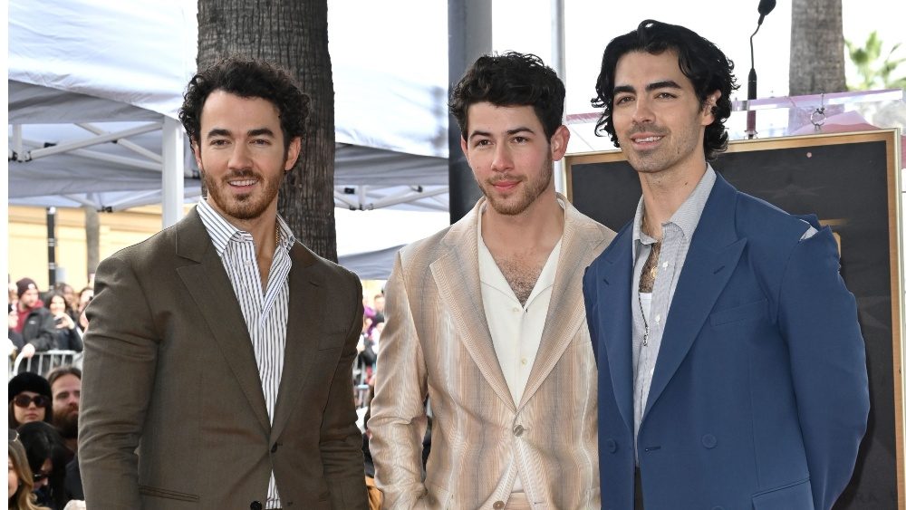 Listen to Jonas Brothers’ ‘Love Me to Heaven’ in celebration of 20th Anniversary
