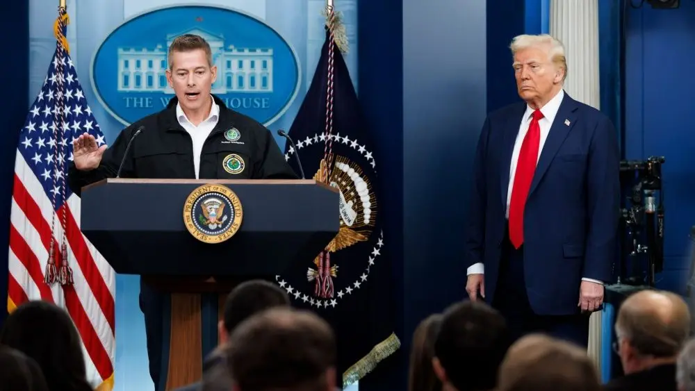 Sean Duffy, Transportation Secretary, speaks at a White House press briefing. Pres. Donald Trump also pictured