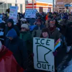 Tensions flare in Minneapolis, as state officials are blocked by FBI from probe of ICE shooting