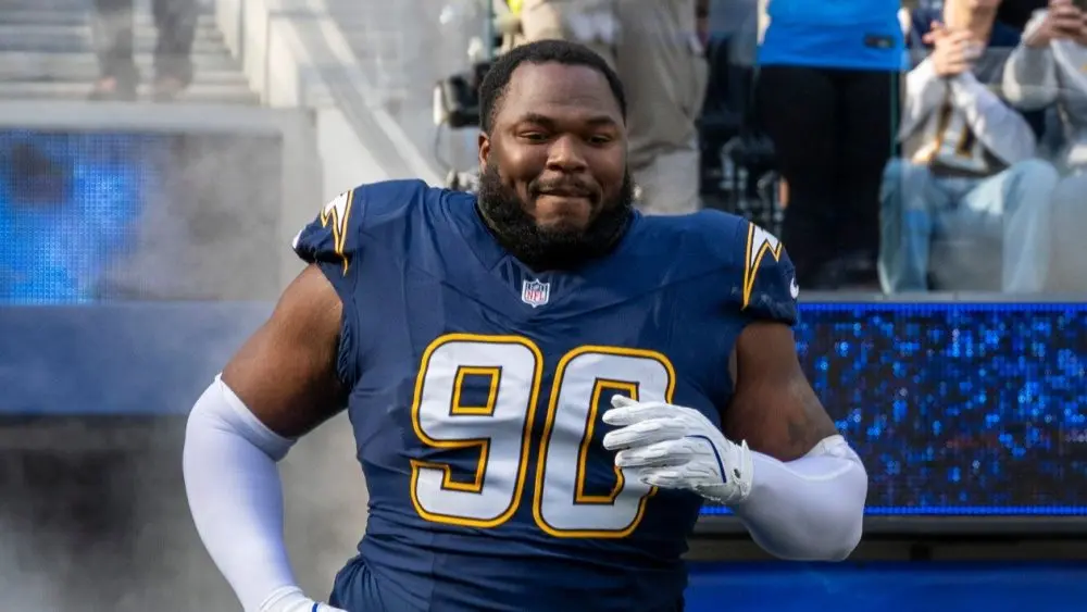 Los Angeles Chargers defensive lineman Teair Tart #90 runs into field before an NFL football game against the Houston Texans at SoFi Stadium, Saturday Dec. 27, 2025, in Inglewood, Calif.