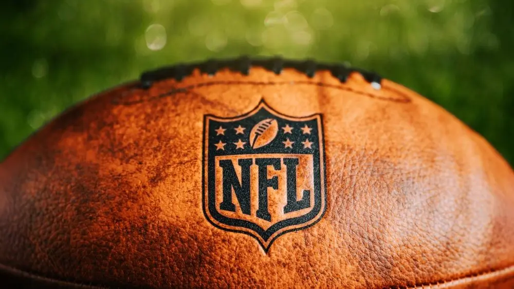 NFL logo on leather ball. Official ball of national football league. Panorama Format NEW YORK, USA, FEBRUARY 11, 2023
