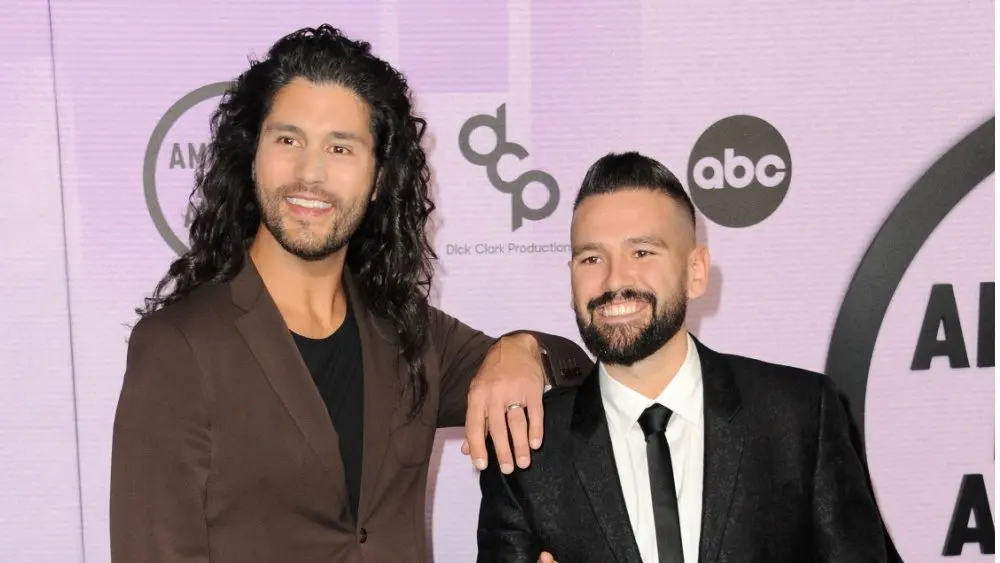 Dan Smyers and Shay Mooney of Dan + Shay at the 2022 American Music Awards held at the Microsoft Theater in Los Angeles, USA on November 20, 2022.