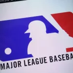 Major League Baseball logo displayed on a modern smartphone