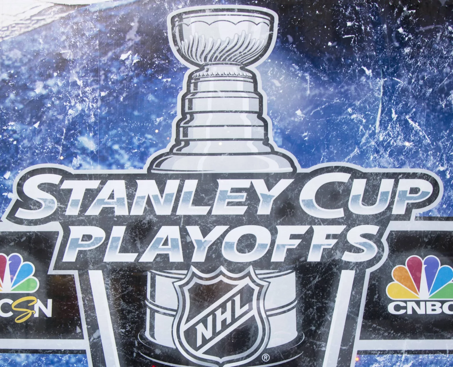 Stanley Cup Playoffs logo displayed at the NBC Experience Store window in midtown Manhattan