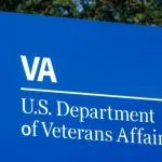 Signage and logo of the U.S. Department of Veterans Affairs - providing healthcare services to military veterans. Fort Wayne - Circa August 2018