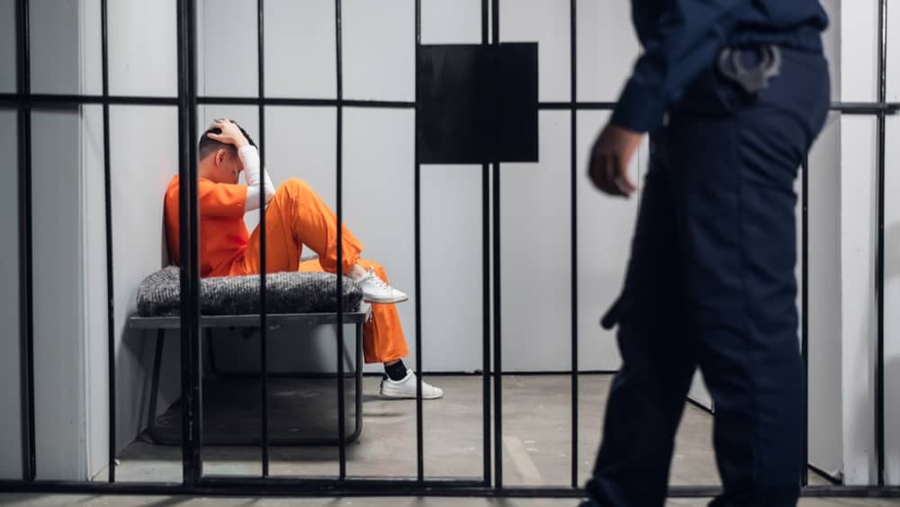 inmate-in-prison-cell