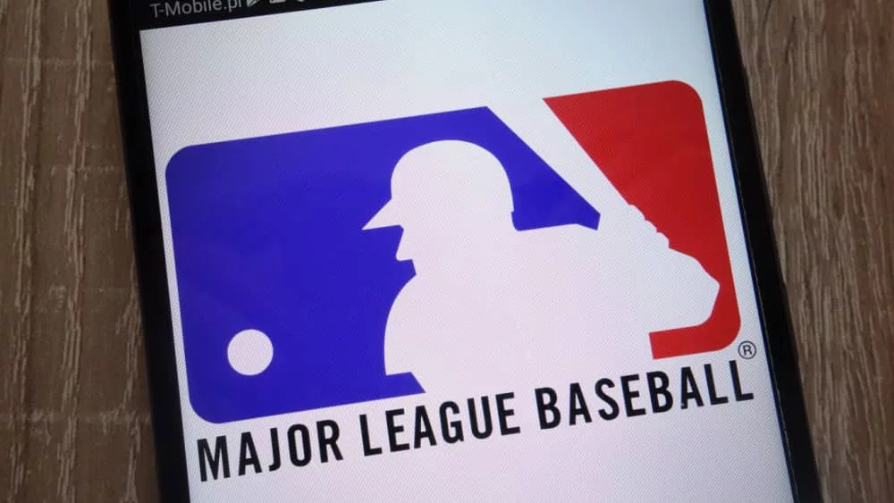 Major League Baseball logo displayed on a modern smartphone