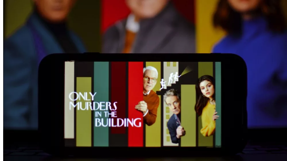 'Only Murders in the Building' logo displayed on smartphone screen.