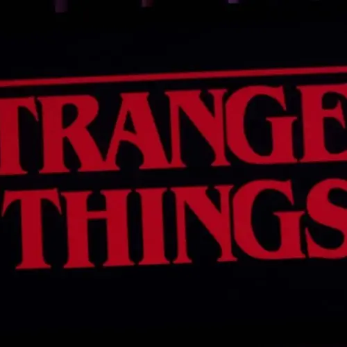 Iphone 11 pro with the Stranger Things logo on top of a computer keyboard. United States^ New York. Sunday^ September 29^ 2019.