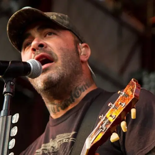 Aaron Lewis plays his guitar druing the performance of Staind Rockstar Uproar Festival on September 25^ 2012 in Nampa^ Idaho.