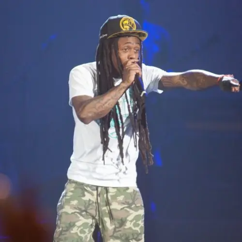 Rapper Dwayne Michael Carter^ Jr. aka Lil Wayne performs in concert as part of America's Most Wanted Tour at Sleep Train Arena on August 28^ 2013 in Sacramento^ California.