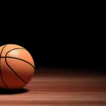 basketball-court-floor-with-ball-isolated-on-black-and-copy-spac