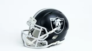 Las Vegas Raiders NFL team helmet on white background.