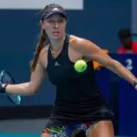 Professional tennis player Jessica Pegula of USA in action during Miami Open 2022 quarter-final match at the Hard Rock Stadium in Miami Gardens^ Florida MIAMI GARDENS^ FLORIDA - MARCH 30^ 2022