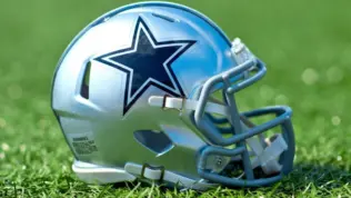 NFL Dallas Cowboys helmet on artificial grass playing turf ^ product shot