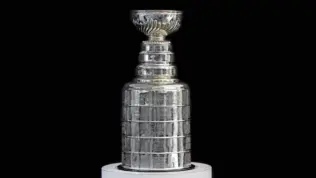 NHL ceremony - Stanley Cup trophy on the white stand^ black background^ Vancouver BC - October 22^ 2018
