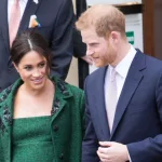 Meghan Markle and Prince Harry receive flowers after leaving Canada House on the March 11^ 2019 in London^ UK