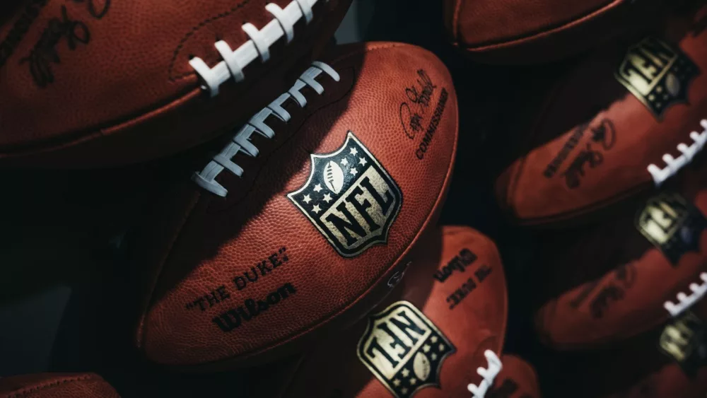 Rows of american football balls in NFL Experience in Times Square^ New York