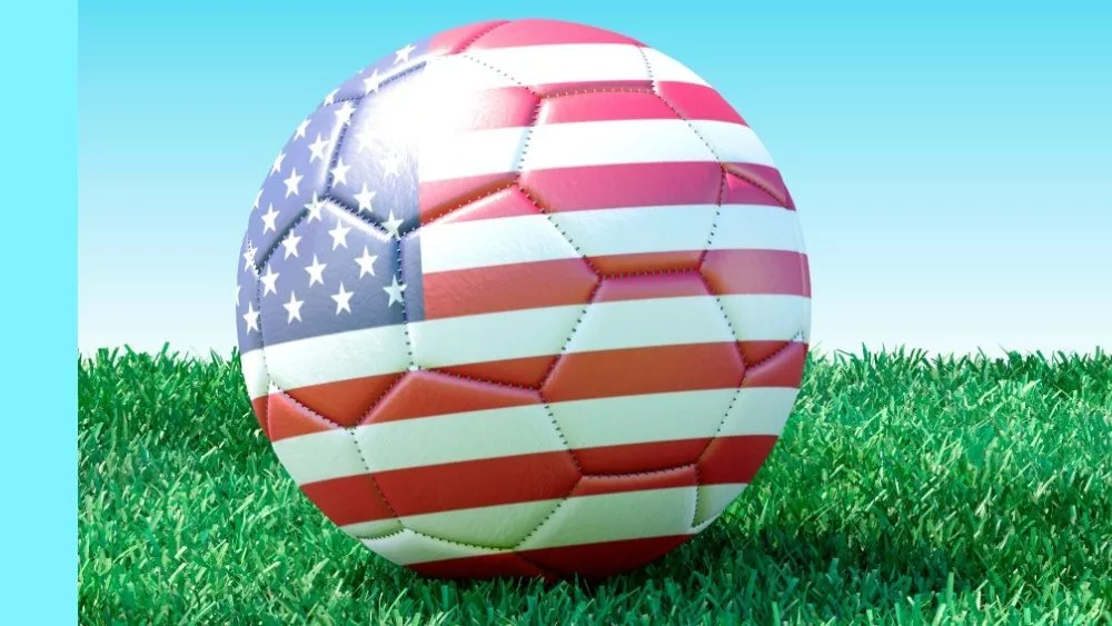 soccer balls in USA flag colors on green grass. Women's soccer. 3d image