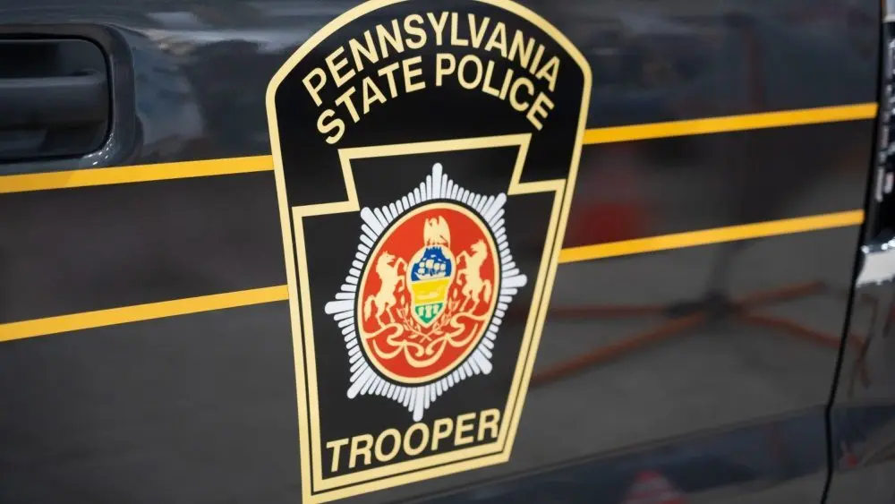 The Pennsylvania State Police Trooper emblem^ on display at the annual PA Farm Show. Harrisburg^ PA / USA - January 8^ 2020