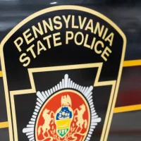 Pennsylvania State Police Trooper emblem on side of police vehicle Harrisburg^ PA / USA