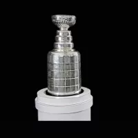 NHL Trophy - Silver Stanley Cup on white stand with black background^ in Vancouver BC on November 3^ 2018