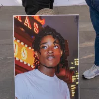 Protesters gather for a "Justice for Jordan Neely" rally calling for the man who used the chokehold on Neely to be apprehended in Washington Square Park on May 05^ 2023 in New York City.