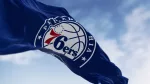 Philadelphia 76rs flag waving on a clear day. American professional basketball team^ Atlantic Division of the Eastern Conference