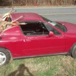 This car is so clunking cool. Paint is peeling off, dents everywhere, exhaust was recently dragging on the pavement. Thanks Balt. Co police for the fix it ticket. 1995 Honda civic del sol. The top comes off on days she’s not hauling deer out of the woods. She’s a hard clunker, with plenty of heart.