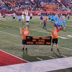 Special Olympics Summer Games: Opening Ceremonies of Special Olympics Illinois State Summer Games was ah-mazing!!!Richie, Preston, and Coach Ferguson represented Mt. Vernon Township High School with Region K in the Parade of Athletes. Neo and Coach Clodi saved seats in the stands. The Woodrome family made a fantastic cheering section! The Law Enforcement Torch Run (LETR) raised $4.5 million for Special Olympics Illinois this year!! They truly are the Guardians of the Flame of Hope because without them, all of this would not be possible. Thank YOU if you have ever donated to a Polar Plunge, Cop on the Rooftop event at Dunkin' Donuts, Plane Pulls, or any other LETR fundraiser. The cauldron has been lit with the Flame of Hope, the Athlete Oath has been recited, and the Games have been declared open! "Let me win. But if I cannot win, let me be brave in the attempt." ~Athlete Oath (Submitted by Megan Clodi)