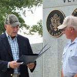 Governor-Greg-Gianforte-reading-letter-of-commendation-