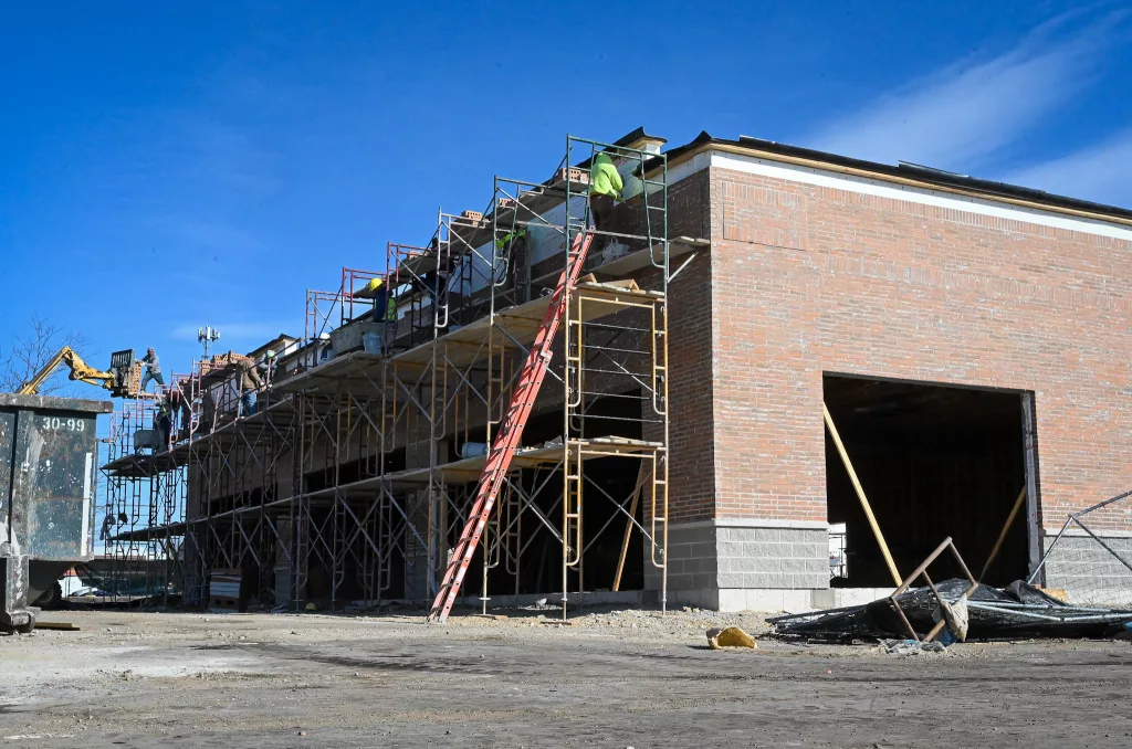 Three-business building anchored by Dunkin' under construction in ...