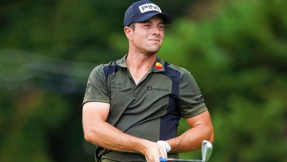Viktor Hovland (NOR) tees off the 2nd hole during the first round on August 29^ 2024 at the 2024 TOUR Championship at East Lake Golf Club.