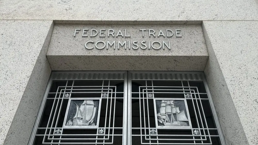 Federal Trade Commission sign and entry to headquarters of FTC^ an independent agency of the US government. WASHINGTON - JUNE 8^ 2025