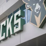 Milwakee Bucks text and logo at NBA Basketball Fiserv Forum arena