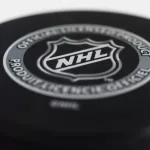 Officiel licensed hockey puck for NHL^ National hockey league.