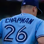 Toronto Blue Jays third baseman Matt Chapman jogs from the dugout during a game against Oakland Athletics at the Oakland Coliseum. July 5^ 2022