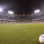 Los Angeles - October 12^ 2022: Selective focus of baseball in outfield grass at Dodger Stadium