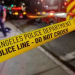 LAPD Los Angeles Police Department Crime Scene Tape with officers and ambulance. Los Angeles California - June 3 2023