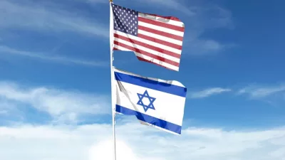 American and Israeli flags fly in the cloudy sky