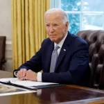 U.S. President Joe Biden speaks to members of the news media while receiving a briefing about the ongoing wildfire season in the Oval Office at the White House on September 17^ 2024 in Washington^ DC.