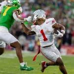 Ohio State running back Quinshon Judkins #1 escapes a tackle-attempt during the 2025 Rose Bowl game on Jan. 1^ 2024^ in Pasadena^ Calif.