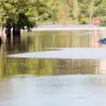 Cars submerged underwater in the aftermath of Hurricane Ida. New Brunswick^ New Jersey - September 2^ 2021