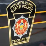 The Pennsylvania State Police Trooper emblem^ on display at the annual PA Farm Show. Harrisburg^ PA / USA - January 8^ 2020