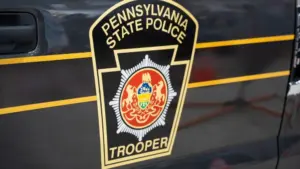 The Pennsylvania State Police Trooper emblem^ on display at the annual PA Farm Show. Harrisburg^ PA / USA - January 8^ 2020